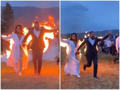 Watch: दूल्हे और दुल्हन ने खुद पर लगाई आग, अपनी ही शादी में की डेयरडेविल एंट्री