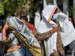 Heatwave in Delhi: दिल्ली में गर्मी ने अपनाया रौद्र रूप, चिलचिलाती धूप ने बढ़ाई लोगों की मुश्किलें, देखें तस्वीरें