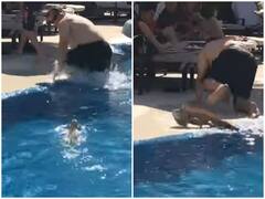 Watch: गर्मी से बचने के लिए स्विमिंग पुल में घुसी बड़ी छिपकली, भागते दिखे लोग