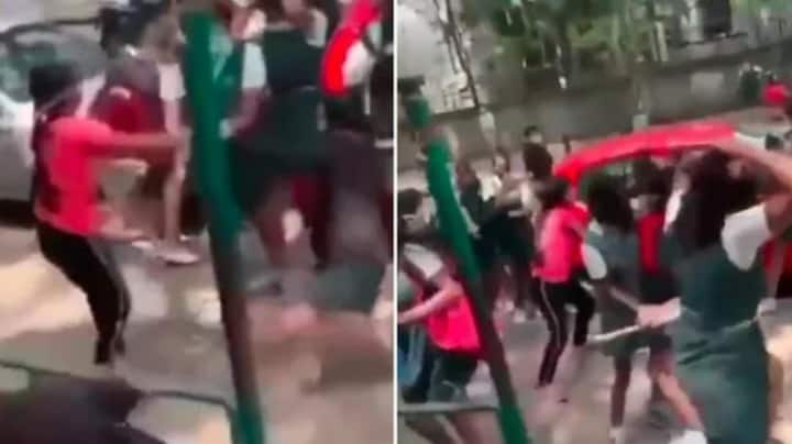 Viral Video: In Bengaluru school girls fights on roads vide goes viral on social media Viral News: બેંગ્લુરુની સકડો પર વિદ્યાર્થીનીઓના બે ગ્રુપમાં થઈ બબાલ, ઢીકા-પાટુ મારીને ખેંચ્યા વાળ, વીડિયો થયો વાયરલ