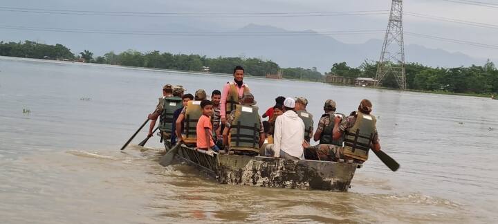 The Air Force has been asked to airdrop essential supplies to affected districts from Wednesday. One of the worst affected is Cachar district. Two columns of Army and Assam Rifles personnel of Masimpur garrison have been rushed for flood rescue operations in various parts of the district. (Image Source:IANS)