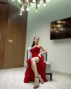 Tejasswi Prakash Gracefully Poses In A Red Slit Dress - SEE PICS