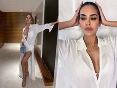 Esha Gupta Photos: ईशा गुप्ता ने व्हाइट ड्रेस में दिखाया किलर अवतार, फोटोज देख फैंस बोले-'फ्लावर नहीं फायर है'