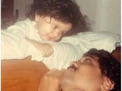 Guess Who: पिता को मासूम निगाहों से निहारती इस बच्ची को पुकारते हैं लेडी खिलाड़ी कुमार, पहचाना क्या?