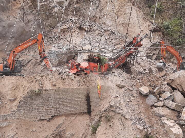 Rescue operation underway after a portion of an under-construction tunnel on the Jammu-Srinagar national highway caved-in near Magerkote in Ramban district on Friday. (Image Source: PTI)