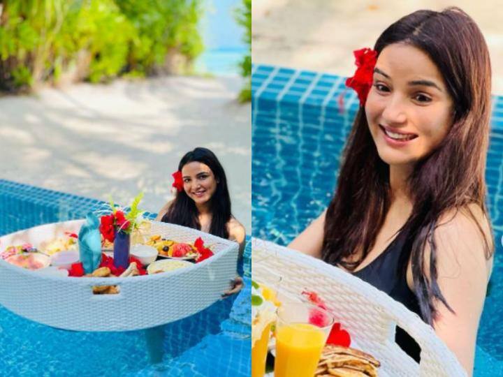 Jasmin Bhasin maldives vacation photos are all over the internet Vacation Mode: मालदीव में छुट्टिया मानाने पहुंची Jasmin Bhasin, पूल में ब्रेकफास्ट करती आई नज़र