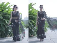 Photos: लहराती ज़ुल्फ़ों की आड़ में काली साड़ी पहने Surbhi Jyoti ने उड़ाया गर्दा, देखें तस्वीरें