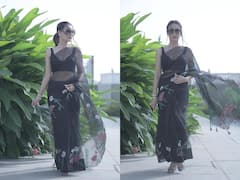 Photos: लहराती ज़ुल्फ़ों की आड़ में काली साड़ी पहने Surbhi Jyoti ने उड़ाया गर्दा, देखें तस्वीरें