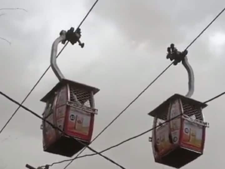 Devotees Stranded Midair As Cable Car Services Halt Due To Bad Weather In MP's Satna | WATCH Devotees Stranded Midair As Cable Car Services Halt Due To Bad Weather In MP's Satna | WATCH