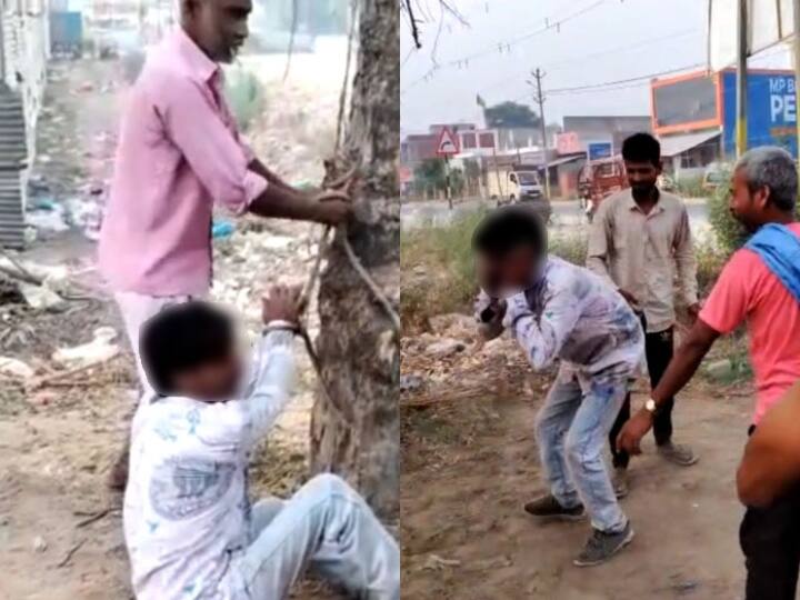 Amroha a mentally disabled boy beaten by crowd on suspicion of theft, Video viral on social media ann Amroha News: अमरोहा में चोरी के शक में मंदबुद्धि युवक को पेड़ से बांधकर पीटा, 3 आरोपी गिरफ्तार