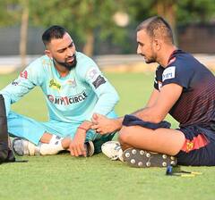 IPL 2022 Photos: एलिमिनेटर मैच से पहले RCB और LSG के खिलाड़ी दिखे साथ, बातचीत करते दिखे कोहली और राहुल