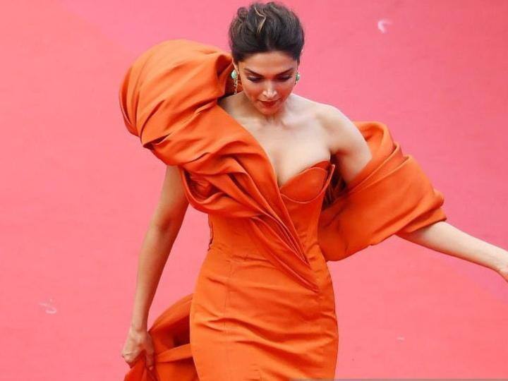 Deepika Padukone trolled At Cannes 2022 due to struggles with her gown, watch video here Cannes 2022: गाउन को लेकर दीपिका पादुकोण हुईं ट्रोल, फैन्स बोले- 'करवा ली बेज्जइती'