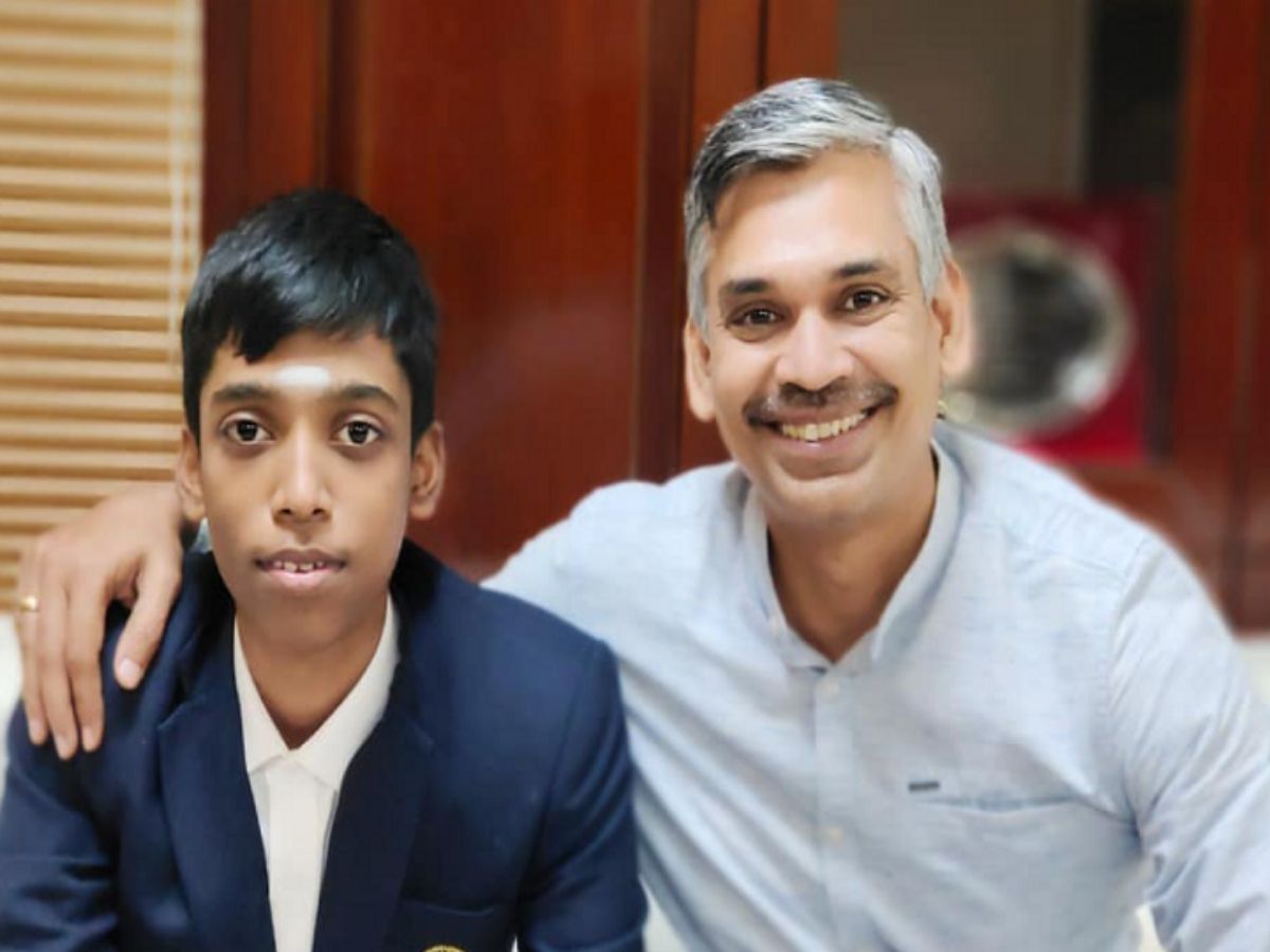 Rameshbabu Praggnanandhaa with Viswanathan Anand. Rameshbabu