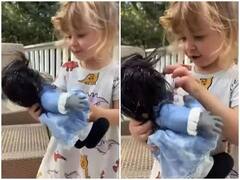 Trending News : आईने चिमुरडीला 'हॉन्टेड डॉल' दिली भेट! चिमुरडीच्या चेहऱ्यावरील हावभाव पाहून नेटकरी आश्चर्यचकित