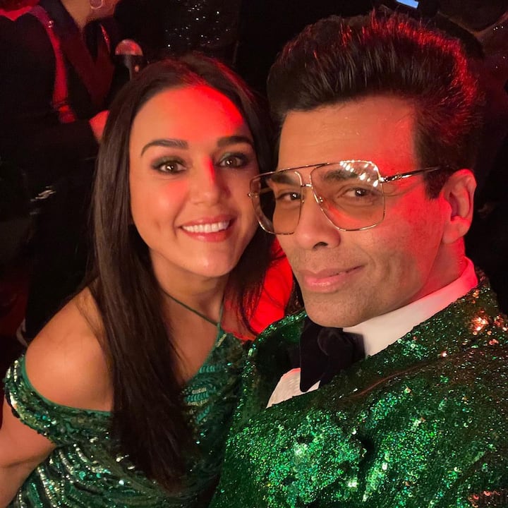 In one of the pictures, Preity can be seen twinning in a green shimmer dress with Karan, who wore a green sequined blazer, adding all the bling to his look.