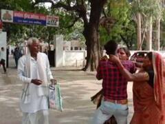 Viral: हरदोई में महिला थाने के सामने पति-पत्नी के बीच जमकर हुई मारपीट, वीडियो वायरल