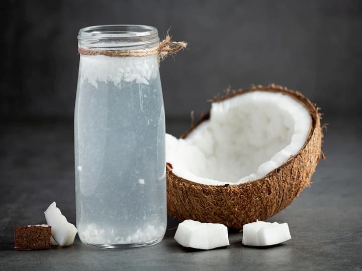 Can coconut oil help with thyroid health? Coconut Oil : தைராய்டு, தேங்காய் எண்ணெய்.. என்ன சொல்கிறார்கள் மருத்துவர்கள்? ஆய்வுகள் சொல்வது என்ன?