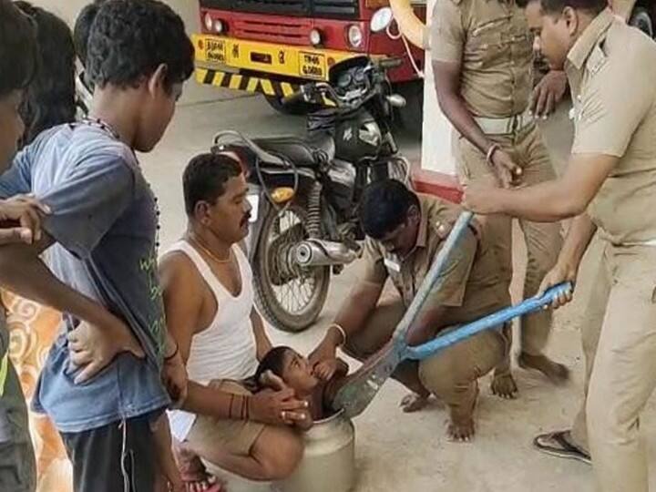 villupuram thiruvennainallur Firefighters rescue boy trapped in Eversilver vessel எவர்சில்வர் குடத்தில் சிக்கிக்கொண்ட சிறுவன்.. இப்படி மீட்ட தீயணைப்புத்துறை.. என்ன ஆச்சு தெரியுமா?