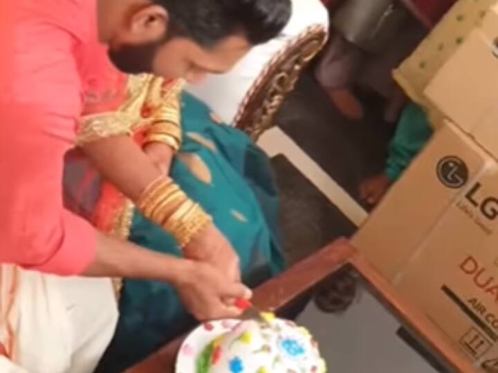 Bride groom got water balloon in cake prank video viral on social media Funny Video: पति-पत्नी को Cake में मिला कुछ ऐसा, जिसे देख छूट जाएगी आपकी हंसी