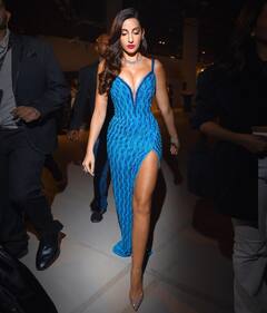 Nora Fatehi Photos: डीप नेक, थाई-हाई स्लिट गाउन में नोरा फतेही का ग्लैमरस लुक बढ़ा देगा इंटरनेट का पारा