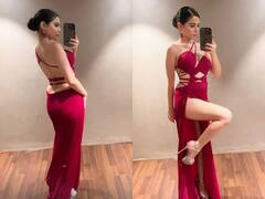 Urfi Javed Photos : लाल रंग की बैकलेस थाई हाई स्लिट ड्रेस पहनकर इतराईं उर्फी जावेद, फ्लॉन्ट किया फिगर