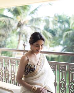 PHOTO: बॉलिवूडच्या धक-धक गर्लचा नवा लूक; ड्रेसची किंमत ऐकून तुम्हालाही बसेल धक्का!