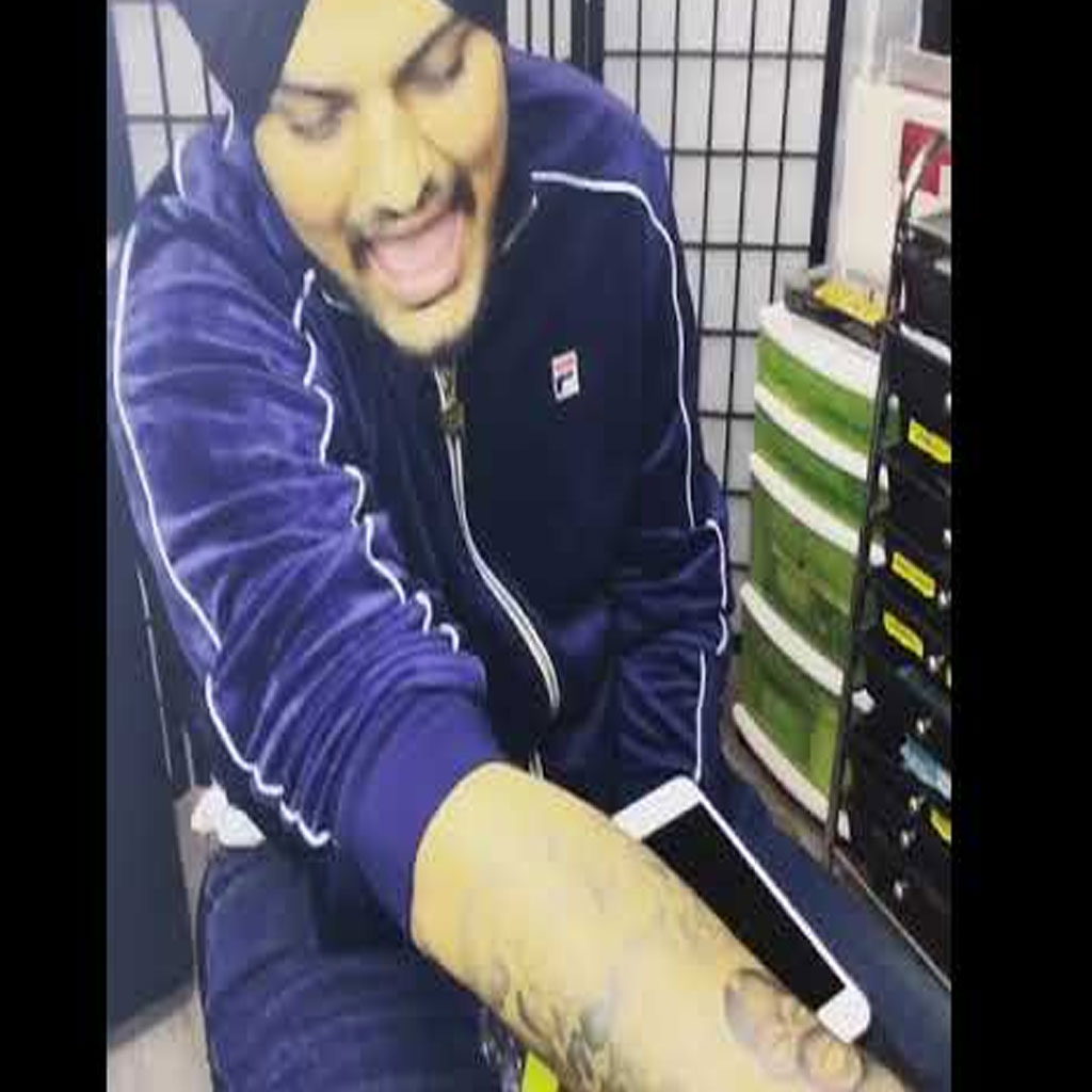 Sidhu Moosewala's parents get their son's tattoo inked on their arms