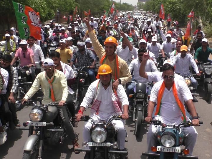 Rajasthan Bharatpur traffic rules violation in BJP Yuva Morcha bike rally on 8 years of Central government ANN Bharatpur News: BJP के आठ साल पूरे होने पर भरतपुर में निकली रैली, बिना हेलमेट के बाइक चलाते नजर आए कार्यकर्ता