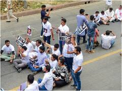 Congress Protest: ED के दफ्तर में राहुल गांधी से हुई पूछताछ, सड़क पर पार्टी ने किया प्रदर्शन, तस्वीरों में देखें कांग्रेस का 'सत्याग्रह'