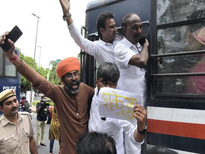 Congress leaders took to the streets on Monday as Rahul Gandhi appeared before the ED for questioning in a money laundering case. In photo, Congress activists being detained during a protest against summoning of the party's president Sonia Gandhi and MP Rahul Gandhi in the National Herald case in New Delhi. (PTI Photo/Kamal Kishore)