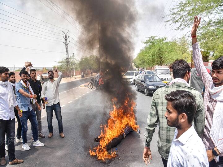 NSUI workers burn an effigy during a protest over summoning of party leader Rahul Gandhi in the National Herald case by ED, in Bikaner, Monday, June 13, 2022. (PTI Photo)