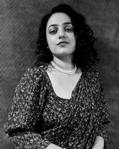 Nithya Menen photos: పూలచీరలో అలనాటి తారను తలపిస్తోన్న 'అలామొదలైంది' తార