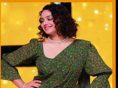 Nithya Menen photos: పూలచీరలో అలనాటి తారను తలపిస్తోన్న 'అలామొదలైంది' తార