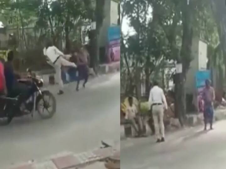 Andhra Pradesh traffic cop suspended after video of him thrashing a drunk man went viral Watch video: பொது இடத்தில் ’குடிமகனை ‘ சரமாரியாக அடித்து உதைத்த போக்குவரத்து காவலர்! வைரலாகும் வீடியோ!