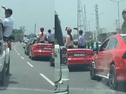 groom fined 2 lakhs for dancing and taking selfies in audi open roof ஆடி காரில் ஆடியபடி சென்ற மணமகன்...  திருமண நாளில் 2 லட்சம் அபராதம்!