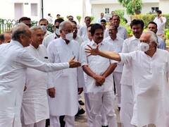 कांग्रेस मुख्यालय पर पार्टी कार्यकर्ताओं और पुलिस में टकराव, देखें तस्वीरें