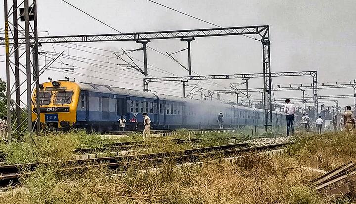 In Bihar's Gopalganj district, the agitating aspirants set three coaches of a passenger train on fire at Sidhwalia railway station. More than 15 districts across Bihar on Thursday witnessed massive protests and vandalism against the Agnipath scheme. (Image: PTI)