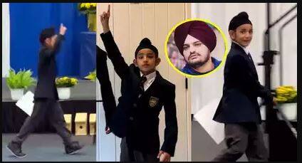 Gippy Grewal's son pays tribute to 'chachu' Sidhu Moosewala by doing his signature thappi step during school graduation ceremony ਗਿੱਪੀ ਗਰੇਵਾਲ ਦੇ ਬੱਚਿਆਂ ਨੇ ਸਿੱਧੂ ਮੂਸੇ ਵਾਲੇ ਨੂੰ ਕੈਨੇਡਾ 'ਚ ਸਿਗਨੇਚਰ ਸਟੈਪ ਕਰ ਦਿੱਤੀ ਸ਼ਰਧਾਂਜਲੀ, ਵੇਖੋ ਵੀਡੀਓ