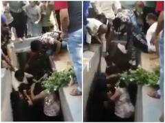 Watch: प्रॉपर्टी विवाद में नाले में घुसकर महिलाओं ने की मारपीट, जमकर चले लात-घुसे