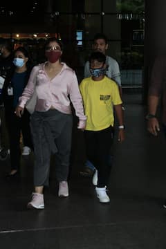 Kajol Airport Look: एयरपोर्ट पर बेटे युग का हाथ थामे दिखीं काजोल देवगन, वायरल हुईं फोटोज