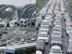 कई किलोमीटर लंबा जाम, रेंगती गाड़ियों के बीच लोग परेशान... तस्वीरों में देखें दिल्ली से नोएडा और गुरुग्राम तक का नजारा