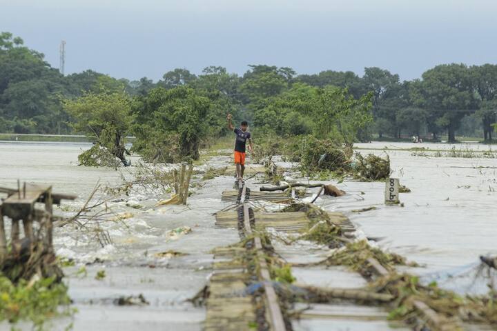 More than 30 people have died due to floods in Bangladesh. Sunamganj and Sylhet districts in the northeastern region as well as in Lalmonirhat, Kurigram, Nilphamari and Rangpur districts in northern Bangladesh have been worst hit. (Image Source: AFP)