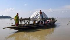 Assam Flood: জলস্তর বেড়েছে বরাক-ব্রহ্মপুত্রের, ঘরছাড়া বহু বাসিন্দা