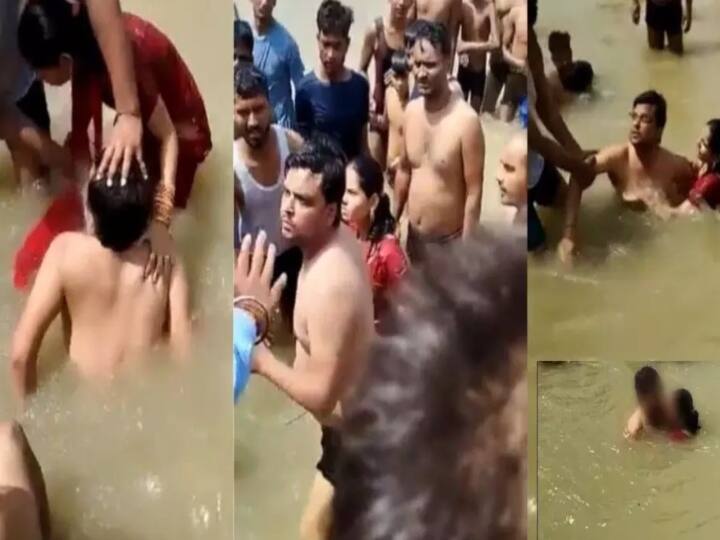 Angry mob beats man for kissing wife in Ayodhya ghat | Watch Video : புனித நதியில் மனைவிக்கு முத்தம் கொடுத்த கணவன்..  சுற்றிவளைத்த கும்மியெடுத்த ராம பக்தர்கள்..