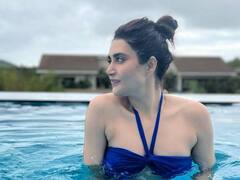 PHOTO: करिश्मा आणि वरुणचा रोमँटिक अंदाज; स्विमिंग पूलमध्ये दिल्या पोज!