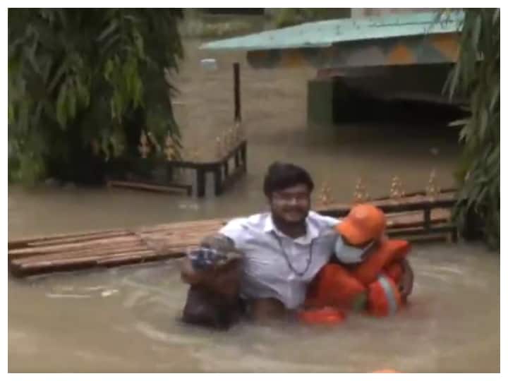 Assam Man Wades Through Waist-Deep Water To Greet Chief Minister, watch video Assam Floods: Man Wades Through Waist-Deep Water To Greet CM Himanta Sarma | WATCH