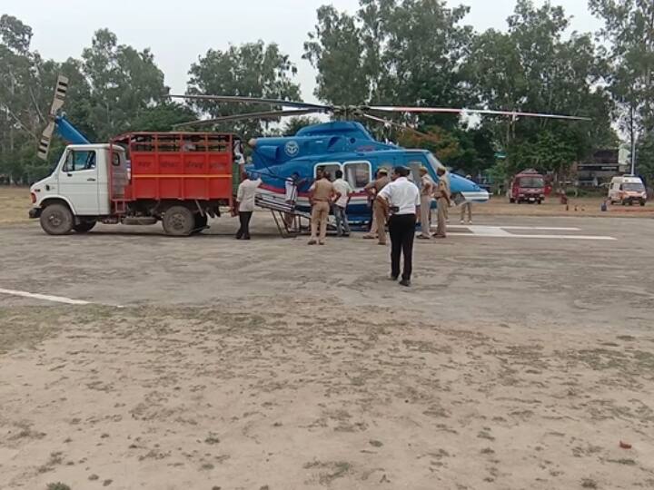 Varanasi Yogi Adityanath Helicopter landing in Police line Pratapgarh due to fuel crisis ANN Varanasi News: वाराणसी में सीएम योगी के हेलीकाप्टर की इमरजेंसी लैंडिंग, ईधन भरने के बाद लखनऊ के लिए हुआ रवाना