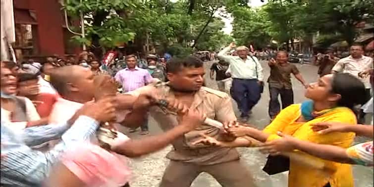 SUCI holds protest rally in Kolkata against alleged SSC Scam, Agnipath Scheme and Price Hike clashes with police SUCI Protests: SUCI-এর আইন অমান্য কর্মসূচি ঘিরে ধুন্ধুমার, পুলিশের সংঘর্ষ বিক্ষোভকারীদের, দীর্ঘ ক্ষণ অবরুদ্ধ রইল ধর্মতলা