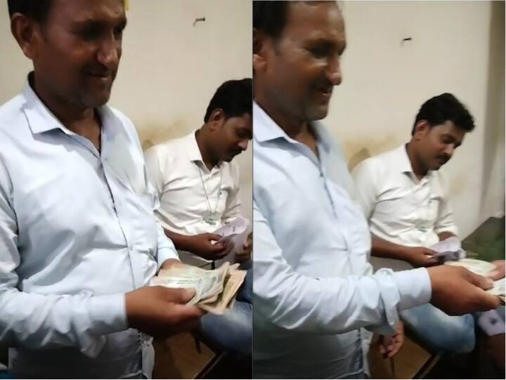 MP Panchayat Election 2022: सिंगरौली में वोट के बदले नोट बांटते सरपंच प्रत्याशी का वीडियो वायरल, उम्मीदवारी निरस्त करने की मांग MP News Video of Sarpanch candidate distributing note to voter goes viral in Singrauli ANN MP Panchayat Election 2022: सिंगरौली में वोट के बदले नोट बांटते सरपंच प्रत्याशी का वीडियो वायरल, उम्मीदवारी निरस्त करने की मांग