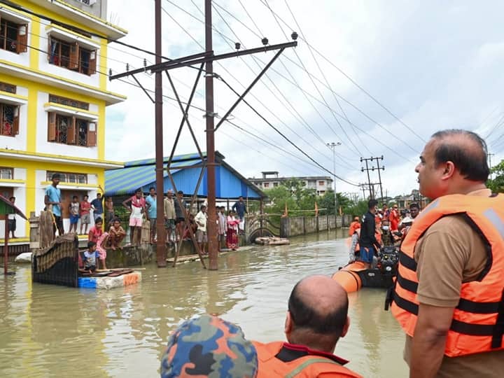 Assam Chief Minister Himanta Biswa Sarma conducts an inspection of the damage in aftermath of floods at Rangirkhari in Silchar. Silchar town in Cachar district continued to remain inundated for the last 10 days. (Source: PTI)